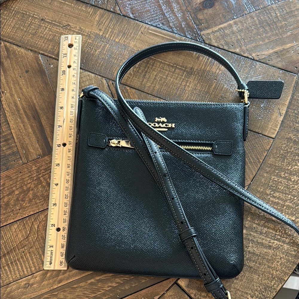 Coach Black Leather Crossbody Bag with Gold Accents - Picture 2 of 7